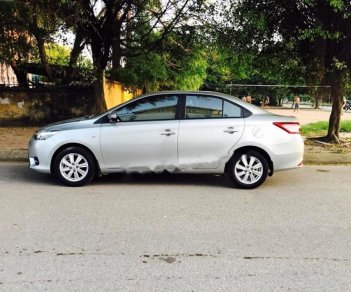 Toyota Vios 1.3 MT 2014 - Cần bán xe Toyota Vios MT đời 2014, màu bạc số sàn, giá 410tr