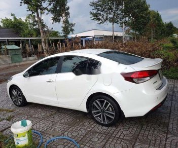 Kia Cerato  2.0 AT 2017 - Cần bán lại xe Kia Cerato 2.0 AT đời 2017, màu trắng  