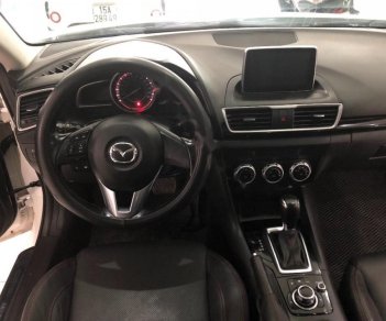 Mazda 3 1.5L 2015 - Bán xe Mazda 3 1.5L năm 2015, màu trắng chính chủ, giá chỉ 609 triệu