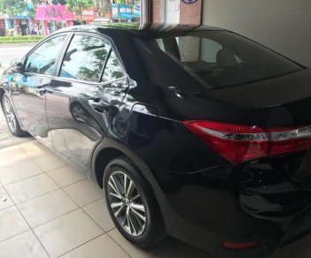 Toyota Corolla altis 1.8 G 2014 - Cần bán lại xe Toyota Corolla Altis 1.8 G 2014, màu đen chính chủ, giá 605tr