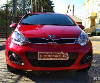 Kia Rio 1.4 AT 2014 - Bán Kia Rio 1.4 AT năm 2014, màu đỏ, xe nhập