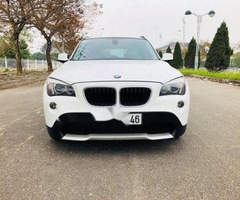 BMW X1 2011 - Bán xe BMW X1 đời 2011, màu trắng