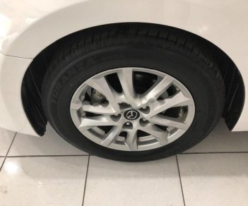 Mazda 3 1.5L 2015 - Bán xe Mazda 3 1.5L năm 2015, màu trắng chính chủ, giá chỉ 609 triệu