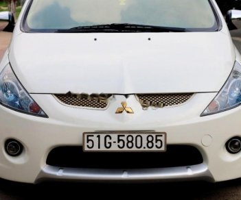 Mitsubishi Grandis 2.4 AT 2011 - Cần bán xe Mitsubishi Grandis 2.4 AT đời 2011, màu trắng xe gia đình