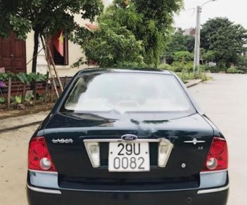 Ford Laser Ghia 1.8 MT 2003 - Cần bán lại xe Ford Laser Ghia 1.8 MT đời 2003, màu xanh lam  