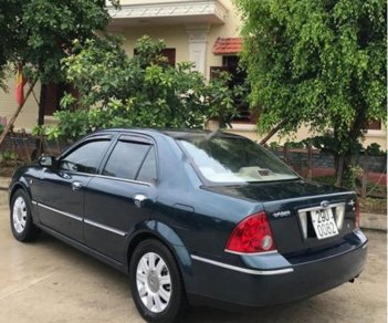 Ford Laser Ghia 1.8 MT 2003 - Cần bán lại xe Ford Laser Ghia 1.8 MT đời 2003, màu xanh lam  