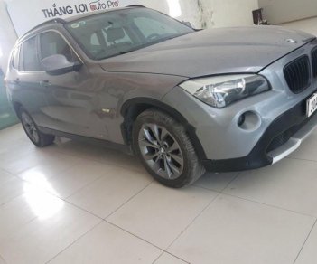 BMW X1 sDrive18i 2010 - Bán xe BMW X1 sDrive18i đời 2010, màu bạc, xe nhập  