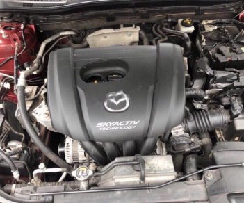 Mazda 323 1.5 AT 2016 - Bán xe Mazda 323 1.5 AT sản xuất năm 2016, màu đỏ
