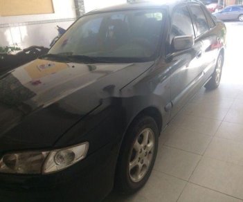 Mazda 626 2003 - Bán xe Mazda 626 sản xuất 2003, màu đen xe gia đình