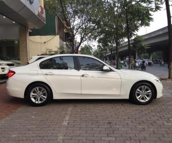 BMW 3 Series 320i 2015 - Cần bán lại xe BMW 3 Series 320i đời 2015, màu trắng, nhập khẩu như mới