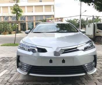 Toyota Corolla altis 2018 - Bán ô tô Toyota Corolla altis sản xuất năm 2018, màu bạc, 678tr