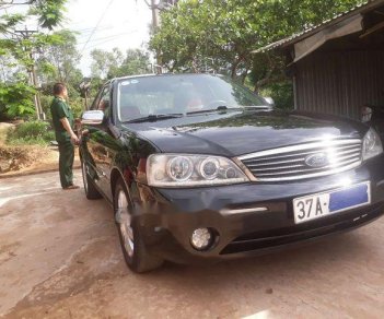 Ford Laser 2004 - Cần bán lại xe Ford Laser sản xuất 2004, màu đen chính chủ, 245 triệu