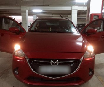 Mazda 2   2015 - Chính chủ bán ô tô Mazda 2 sản xuất 2015, màu đỏ, xe nhập