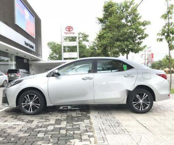 Toyota Corolla altis 2018 - Bán ô tô Toyota Corolla altis sản xuất năm 2018, màu bạc, 678tr