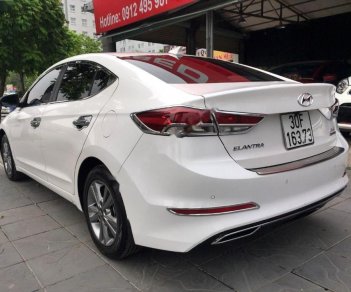 Hyundai Elantra 1.6AT 2017 - Cần bán lại xe Hyundai Elantra 1.6AT đời 2017, màu trắng còn mới