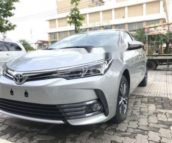 Toyota Corolla altis 2018 - Bán ô tô Toyota Corolla altis sản xuất năm 2018, màu bạc, 678tr