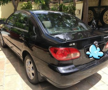 Toyota Corolla altis G 2004 - Bán Toyota Corolla Altis 2004 1.8G, màu đen, số sàn, giá 285 triệu