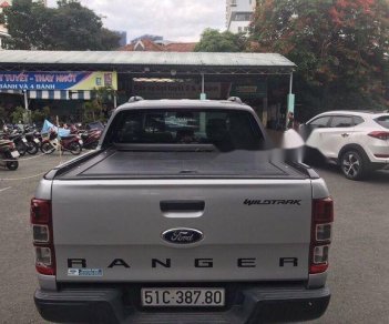 Ford Ranger Wildtrak 2.2 2014 - Cần bán lại xe Ford Ranger Wildtrak 2.2 2014, màu bạc ít sử dụng, 595 triệu