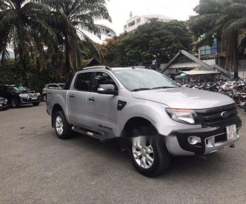 Ford Ranger Wildtrak 2.2 2014 - Cần bán lại xe Ford Ranger Wildtrak 2.2 2014, màu bạc ít sử dụng, 595 triệu