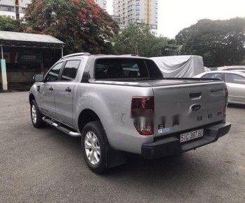 Ford Ranger Wildtrak 2.2 2014 - Cần bán lại xe Ford Ranger Wildtrak 2.2 2014, màu bạc ít sử dụng, 595 triệu