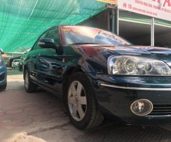 Ford Laser GHIA 1.8 MT 2003 - Bán lại xe Ford Laser GHIA 1.8 MT đời 2003, màu xanh lam