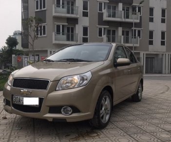 Chevrolet Aveo LT 1.5 MT 2014 - Cần bán Chevrolet Aveo LT 1.5 MT 2014, màu vàng cát, biển Hà Nội