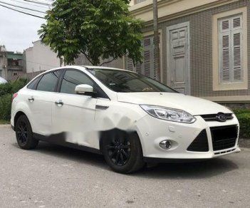 Ford Focus 2.0 Titanium  2014 - Bán Ford Focus 2.0 Titanium năm 2014, màu trắng giá cạnh tranh