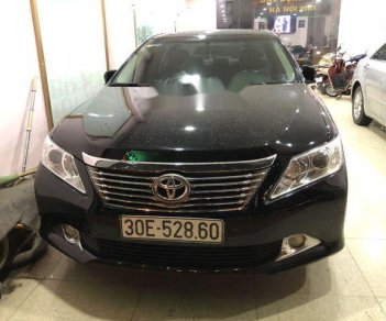 Toyota Camry   2.0E  2014 - Cần bán lại xe Toyota Camry 2.0E đời 2014, màu đen chính chủ, 775tr