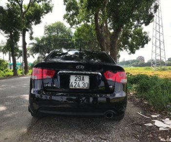 Kia Forte SX 1.6 AT 2011 - Bán xe Kia Forte 1.6 SX AT năm 2011, màu đen