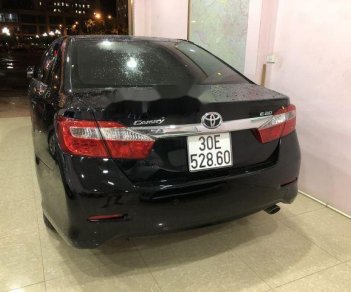 Toyota Camry   2.0E  2014 - Cần bán lại xe Toyota Camry 2.0E đời 2014, màu đen chính chủ, 775tr