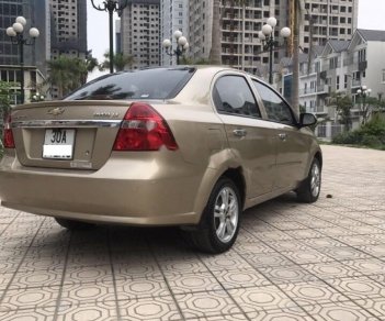 Chevrolet Aveo LT 1.5 MT 2014 - Cần bán gấp Chevrolet Aveo 1.5MT sản xuất 2014, màu vàng xe gia đình