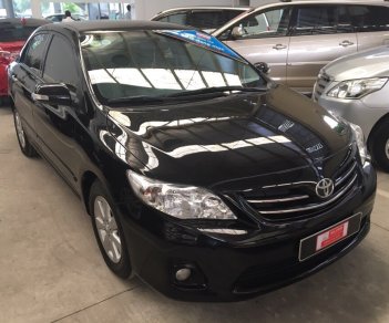 Toyota Corolla altis 2012 - Cần bán lại xe Toyota Corolla altis đời 2012, màu đen số sàn, 530tr