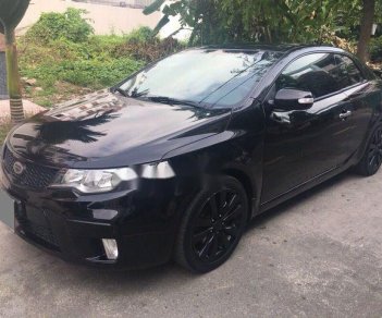 Kia Forte 2010 - Cần bán lại xe Kia Forte 2010, màu đen