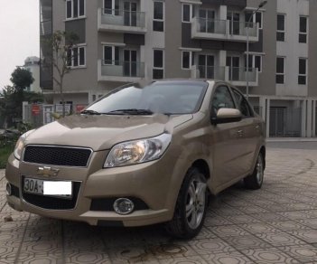 Chevrolet Aveo LT 1.5 MT 2014 - Cần bán gấp Chevrolet Aveo 1.5MT sản xuất 2014, màu vàng xe gia đình