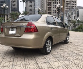 Chevrolet Aveo LT 1.5 MT 2014 - Cần bán Chevrolet Aveo LT 1.5 MT 2014, màu vàng cát, biển Hà Nội