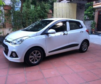 Hyundai Grand i10 Grand 1.0 AT 2014 - Cần bán gấp Hyundai Grand i10 1.0 2014, màu trắng, nhập khẩu