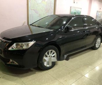 Toyota Camry   2.0E  2014 - Cần bán lại xe Toyota Camry 2.0E đời 2014, màu đen chính chủ, 775tr