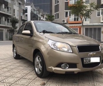 Chevrolet Aveo LT 1.5 MT 2014 - Cần bán gấp Chevrolet Aveo 1.5MT sản xuất 2014, màu vàng xe gia đình