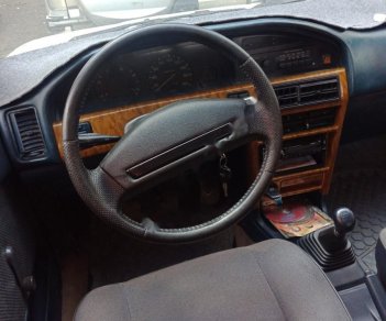 Toyota Corolla 1.3 MT   1990 - Cần bán Toyota Corolla 1.3 MT năm 1990, màu trắng, nhập khẩu nguyên chiếc