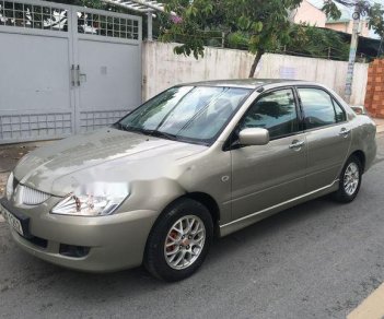 Mitsubishi Lancer 2003 - Gia đình bán lại xe Mitsubishi Lancer đời 2003, màu xám