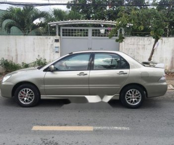 Mitsubishi Lancer 2003 - Gia đình bán lại xe Mitsubishi Lancer đời 2003, màu xám