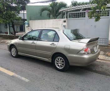 Mitsubishi Lancer 2003 - Gia đình bán lại xe Mitsubishi Lancer đời 2003, màu xám