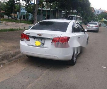 Chevrolet Cruze    LS   2014 - Cần bán xe Chevrolet Cruze màu trắng T12/2014, xe chính chủ giữ kỹ