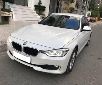 BMW 3 Series  320i  2013 - Cần bán lại xe BMW 3 Series 320i sản xuất 2013, màu trắng, giá tốt