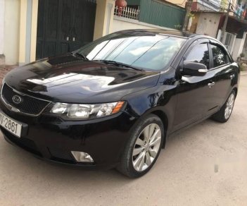 Kia Forte  SLI 2009 - Bán Kia Forte SLI đời 2009, màu đen 