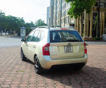 Kia Carens 2.0 2009 - Cần bán Kia Carens 2.0 sx 2009, màu vàng