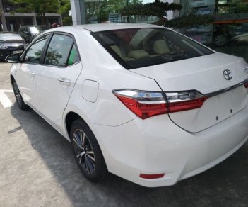 Toyota Corolla altis 1.8G 2018 - Bán ô tô Toyota 1.8G sản xuất năm 2018, màu trắng