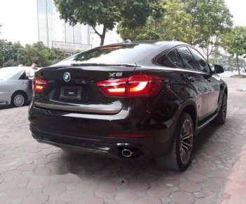 BMW X6   xDriver 35i 3.0L   2015 - Bán lại xe BMW X6 xDriver 35i 3.0L 2015, màu đen, nhập khẩu