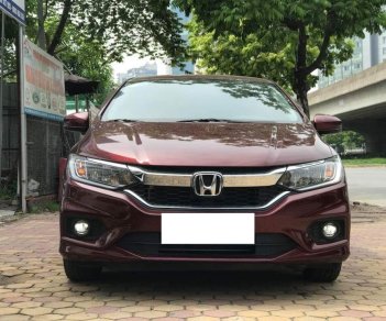 Honda City  Top 1.5 AT 2018 - Bán Honda City Top 1.5 AT sản xuất 03/2018 màu đỏ mận, biển Hà Nội