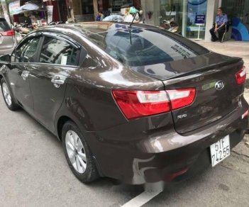 Kia Rio AT  2016 - Cần bán xe Kia Rio AT sản xuất năm 2016, màu nâu, giá 490tr